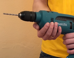 Новинка! Дрель ударная сетевая Makita HP 1641 FK 0,68 кВт 220 В, Двухрежимная, D сверления бетон 16 мм, дерево 30 мм, металл 13 мм HP1641FK