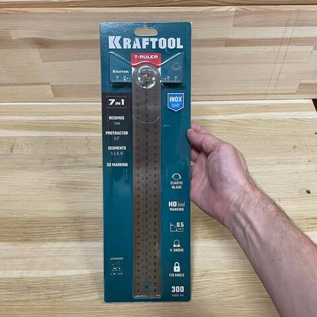 Новинка! Разметочная T - линейка KRAFTOOL 300 мм, многофункциональная 7 в 1 (рейсмус, транспортир с шагом 0.5, разметка сегментов 2,4,8,16, 3D разметка), стальная 34403