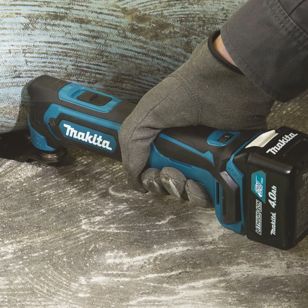 Новинка! Аккумуляторный мультитул 12 В Makita CXT TM 30 DWYE, ДВА аккумулятора 10,8 В/1.5 Ач, зарядное устройство, в кейсе TM30DWYE